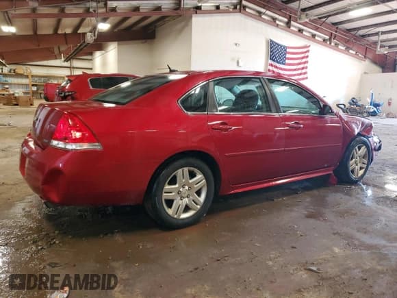 ✅ 2014 Chevrolet Impala LT • VIN: 2G1WB5E3XE1165563 • Лот: 78810554. Опубликован ранее на Copart с пробегом 119 546 миль. Бесплатный доступ к архиву аукционных продаж из США и подробный отчёт об истории автомобиля на DreamBid. Изображение 3.