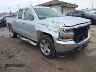 2018 Chevrolet Silverado 1500 LT z VIN 1GCVKREC1JZ140188, wystawiony jako IAAI lot #41878798 z przebiegiem Nie podano mil oraz . Historia ofert i sprzedaży dostępna na DreamBid. Obrazek 1.