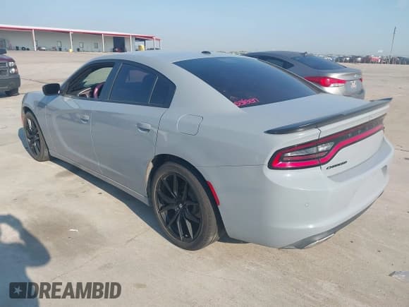 ✅ 2021 Dodge Charger SXT • VIN: 2C3CDXBG4MH576961 • Lot: 43335181. Listed on IAAI with 56,901 mi. Free auction sales archive from the USA and detailed vehicle history report at DreamBid. Image 3.