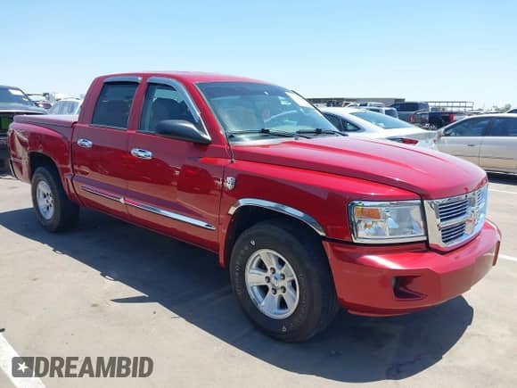 2008 Dodge Dakota Laramie with VIN 1D7HE58N38S519020, listed as a IAAI auction lot 42541144 with 99,171 mi miles and . Bid and sale history available at DreamBid. Image 1.