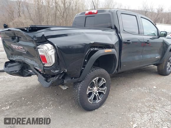 ✅ 2023 GMC Canyon 4WD AT4 • VIN: 1GTP6DEK9P1151776 • Lot: 41655533. Listed on IAAI with 11,750 mi. Free auction sales archive from the USA and detailed vehicle history report at DreamBid. Image 4.