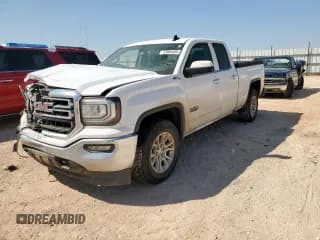 ✅ 2018 GMC Sierra 1500 SLE • VIN: 1GTV2MEC4JZ267892 • Лот: 72064455. Опубликован ранее на Copart с пробегом 260 785 миль. Бесплатный доступ к архиву аукционных продаж из США и подробный отчёт об истории автомобиля на DreamBid. Изображение 1.