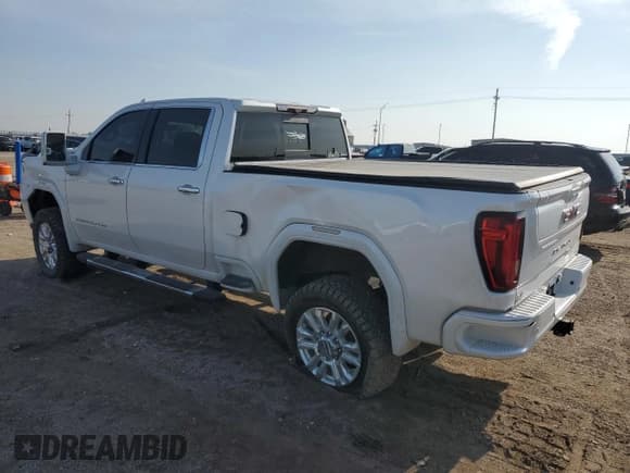 ✅ 2020 GMC Sierra 2500HD Denali • VIN: 1GT49REY1LF222056 • Lot: 71784445. Listed on Copart with 76,058 mi. Free auction sales archive from the USA and detailed vehicle history report at DreamBid. Image 2.