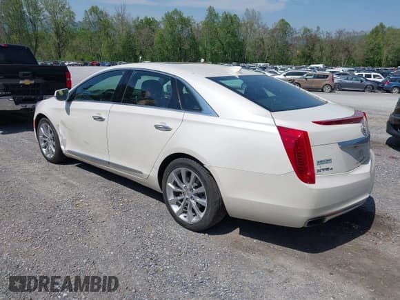 ✅ 2015 Cadillac XTS Luxury • VIN: 2G61N5S33F9172115 • Лот: 42148122. Опубликован ранее на IAAI с пробегом 100 924 миль. Бесплатный доступ к архиву аукционных продаж из США и подробный отчёт об истории автомобиля на DreamBid. Изображение 3.