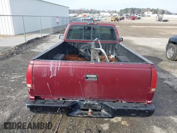 ✅ 1996 GMC Sierra 1500 • VIN: 1GTEC14W4TZ537164 • Лот: 43832032. Опубликован ранее на IAAI с пробегом 222 773 миль. Бесплатный доступ к архиву аукционных продаж из США и подробный отчёт об истории автомобиля на DreamBid. Изображение 16.