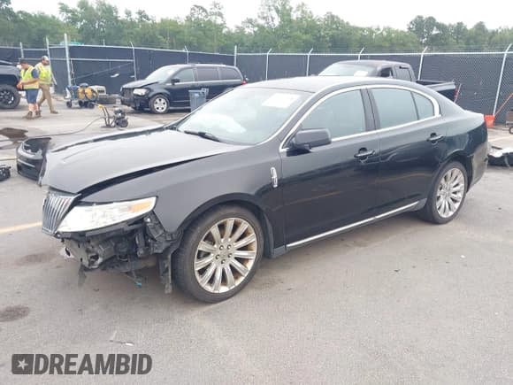 ✅ 2011 Lincoln MKS • VIN: 1LNHL9DR3BG609242 • Lot: 42701568. Listed on IAAI with 149,559 mi. Free auction sales archive from the USA and detailed vehicle history report at DreamBid. Image 2.