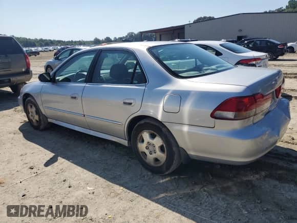 2002 Honda Accord EX с VIN 1HGCG16592A019825, выставлен на аукционе Copart как лот 81120885 с пробегом 172 452 миль миль и Списание • Salvage title. История ставок и продаж доступна на DreamBid. Изображение 2.
