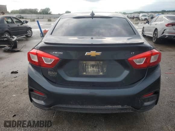 2017 Chevrolet Cruze LT с VIN 1G1BE5SM5H7133128, выставлен на аукционе Copart как лот 65519665 с пробегом 275 516 миль миль и Списание • Salvage title. История ставок и продаж доступна на DreamBid. Изображение 6.