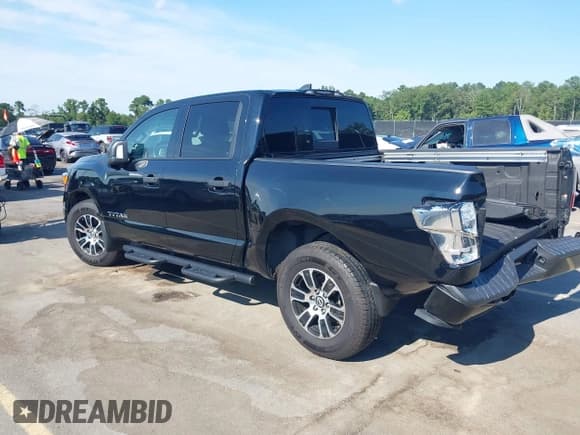 ✅ 2023 Nissan Titan SV • VIN: 1N6AA1EF2PN103435 • Lot: 43076754. Listed on IAAI with 81,879 mi. Free auction sales archive from the USA and detailed vehicle history report at DreamBid. Image 3.