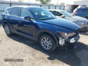 ✅ 2023 Mazda CX-5 S Carbon Edition • VIN: JM3KFBCM2P0250701 • Lot: 42272818. Listed on IAAI with 11,949 mi. Free auction sales archive from the USA and detailed vehicle history report at DreamBid. Image 1.