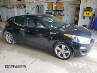 2014 Hyundai Veloster z VIN KMHTC6AD1EU185924, wystawiony jako Copart lot #67472874 z przebiegiem 161 871 mil mil oraz Czysty tytuł • Clean title. Historia ofert i sprzedaży dostępna na DreamBid. Obrazek 4.