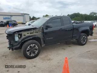 ✅ 2021 Chevrolet Colorado 2WD LT • VIN: 1GCHSCEAXM1260910 • Лот: 63559385. Опубликован ранее на Copart с пробегом 100 801 миль. Бесплатный доступ к архиву аукционных продаж из США и подробный отчёт об истории автомобиля на DreamBid. Изображение 1.