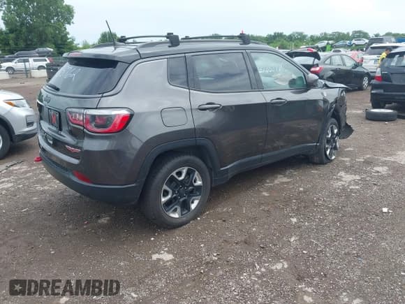 ✅ 2018 Jeep Compass Trailhawk • VIN: 3C4NJDDB7JT135762 • Lot: 42638780. Listed on IAAI with 122,868 mi. Free auction sales archive from the USA and detailed vehicle history report at DreamBid. Image 4.