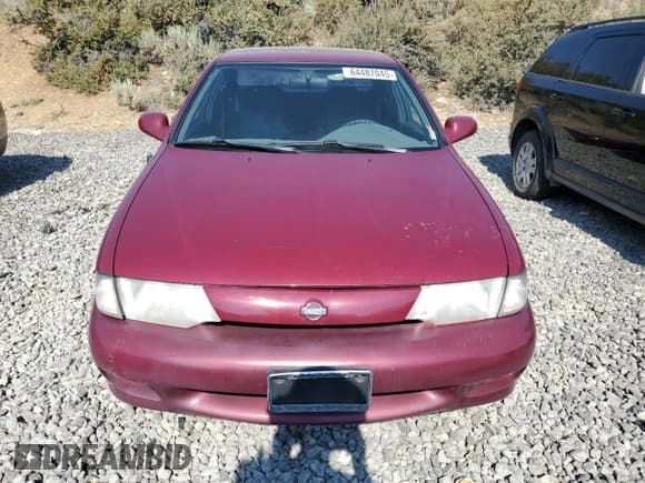 ✅ 1999 Nissan Sentra XE • VIN: 1N4AB41D7XC721910 • Lot: 64487045. Wystawiony na Copart z przebiegiem 75 054 mil. Bezpłatny archiwum sprzedaży aukcyjnych z USA i szczegółowy raport historii pojazdu na DreamBid. Zdjęcie 5.