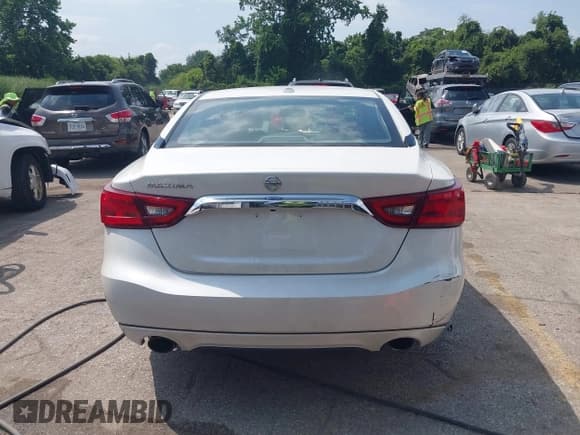 ✅ 2016 Nissan Maxima Platinum • VIN: 1N4AA6AP4GC421640 • Лот: 42817391. Опубликован ранее на IAAI с пробегом 161 728 миль. Бесплатный доступ к архиву аукционных продаж из США и подробный отчёт об истории автомобиля на DreamBid. Изображение 16.