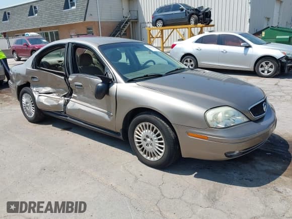 ✅ 2004 Mercury Sable GS • VIN: 1MEFM50U14A621762 • Lot: 42666331. Listed on IAAI with 105,353 mi. Free auction sales archive from the USA and detailed vehicle history report at DreamBid. Image 1.