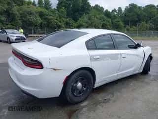 2023 Dodge Charger Police with VIN 2C3CDXAT7PH700708, listed as a IAAI auction lot 43041637 with Not provided miles and . Bid and sale history available at DreamBid. Image 4.
