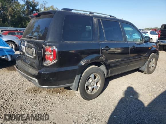 ✅ 2007 Honda Pilot EX-L • VIN: 5FNYF285X7B019597 • Лот: 93108035. Опубликован ранее на Copart с пробегом 261 924 миль. Бесплатный доступ к архиву аукционных продаж из США и подробный отчёт об истории автомобиля на DreamBid. Изображение 3.