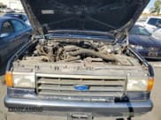 ✅ 1990 Ford Bronco Custom • VIN: 1FMEU15H1LLA84844 • Lot: 70136474. Wystawiony na Copart z przebiegiem 45 605 mil. Bezpłatny archiwum sprzedaży aukcyjnych z USA i szczegółowy raport historii pojazdu na DreamBid. Zdjęcie 12.