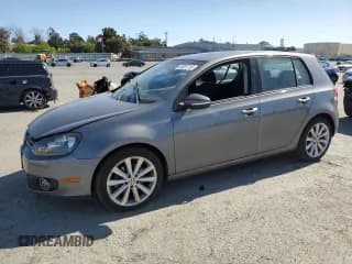 ✅ 2014 Volkswagen Golf TDI w/Sunroof & Nav • VIN: WVWNM7AJ2EW006137 • Lot: 57031715. Listed on Copart with 136,654 mi. Free auction sales archive from the USA and detailed vehicle history report at DreamBid. Image 1.