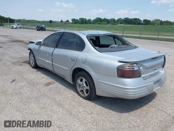 ✅ 2001 Pontiac Bonneville SE • VIN: 1G2HX54K714248607 • Lot: 42389574. Listed on IAAI with 95,907 mi. Free auction sales archive from the USA and detailed vehicle history report at DreamBid. Image 3.