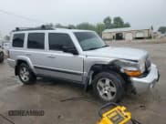 ✅ 2009 Jeep Commander Sport • VIN: 1J8HG48K79C511267 • Lot: 65707875. Listed on Copart with 190,767 mi. Free auction sales archive from the USA and detailed vehicle history report at DreamBid. Image 4.