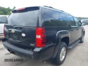 ✅ 2011 Chevrolet Suburban LT • VIN: 1GNSKJE31BR233032 • Lot: 42758398. Listed on IAAI with 167,514 mi. Free auction sales archive from the USA and detailed vehicle history report at DreamBid. Image 4.