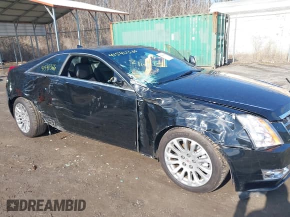 ✅ 2014 Cadillac CTS Premium • VIN: 1G6DH1E32E0177775 • Lot: 41540366. Listed on IAAI with 106,398 mi. Free auction sales archive from the USA and detailed vehicle history report at DreamBid. Image 6.
