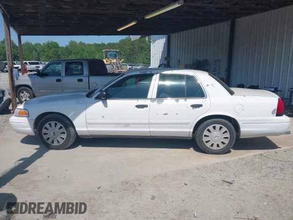 ✅ 2007 Ford Police Interceptor • VIN: 2FAFP71W47X128454 • Lot: 42079360. Wystawiony na IAAI z przebiegiem 263 185 mil. Bezpłatny archiwum sprzedaży aukcyjnych z USA i szczegółowy raport historii pojazdu na DreamBid. Zdjęcie 14.