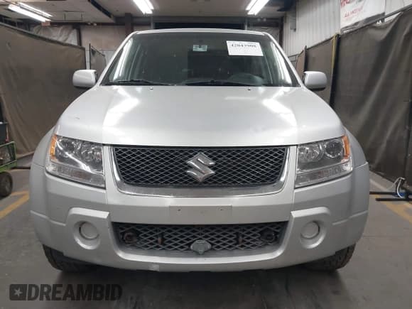 ✅ 2008 Suzuki Grand Vitara w/Spare & Cargo Covers • VIN: JS3TD941X84101254 • Lot: 42043908. Listed on IAAI with 137,180 mi. Free auction sales archive from the USA and detailed vehicle history report at DreamBid. Image 12.