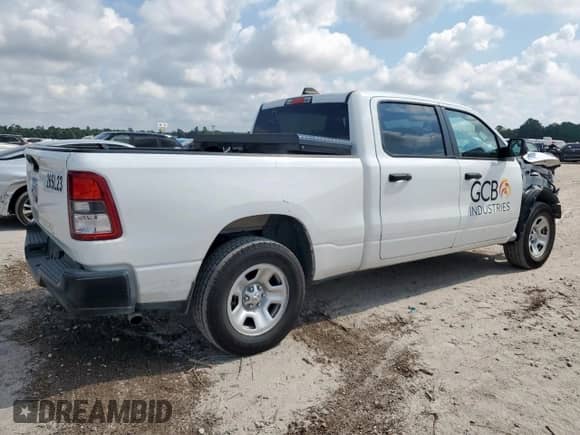 2023 Ram 1500 Tradesman z VIN 1C6RRENTXPN573635, wystawiony jako Copart lot #70497975 z przebiegiem 64 595 mil mil oraz Szkoda całkowita • Salvage title. Historia ofert i sprzedaży dostępna na DreamBid. Obrazek 3.