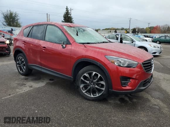 ✅ 2016 Mazda CX-5 Grand Touring • VIN: JM3KE4DY4G0701238 • Lot: 90460315. Listed on Copart with 73,557 mi. Free auction sales archive from the USA and detailed vehicle history report at DreamBid. Image 4.