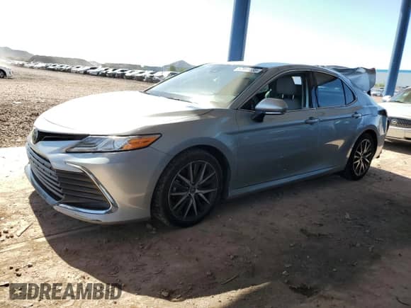 2022 Toyota Camry XLE с VIN 4T1F11AKXNU022225, выставлен на аукционе Copart как лот 57911135 с пробегом 104 183 миль миль и Списание • Salvage title. История ставок и продаж доступна на DreamBid. Изображение 1.