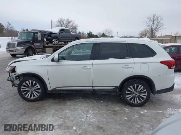 2020 Mitsubishi Outlander ES with VIN JA4AZ3A33LZ011380, listed as a IAAI auction lot 41567914 with 72,663 mi miles and . Bid and sale history available at DreamBid. Image 15.
