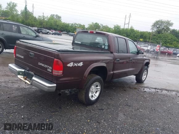 ✅ 2004 Dodge Dakota SLT • VIN: 1D7HG48N04S718220 • Lot: 42258803. Wystawiony na IAAI z przebiegiem 250 757 mil. Bezpłatny archiwum sprzedaży aukcyjnych z USA i szczegółowy raport historii pojazdu na DreamBid. Zdjęcie 4.