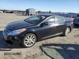 2013 Hyundai Azera z VIN KMHFH4JG4DA308936, wystawiony jako Copart lot #79300904 z przebiegiem 139 306 mil mil oraz Szkoda całkowita • Salvage title. Historia ofert i sprzedaży dostępna na DreamBid. Obrazek 1.