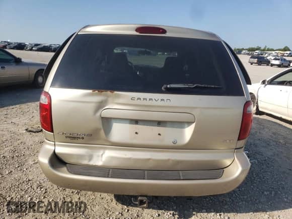 2005 Dodge Caravan SXT with VIN 1D4GP45RX5B318277, listed as a Copart auction lot 65368494 with 108,138 mi miles and Salvage title. Bid and sale history available at DreamBid. Image 6.