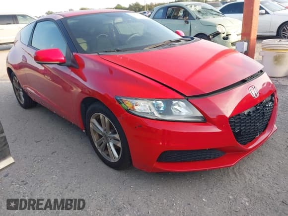 ✅ 2013 Honda CR-Z • VIN: JHMZF1D45DS000514 • Lot: 43854623. Listed on IAAI with 128,559 mi. Free auction sales archive from the USA and detailed vehicle history report at DreamBid. Image 1.