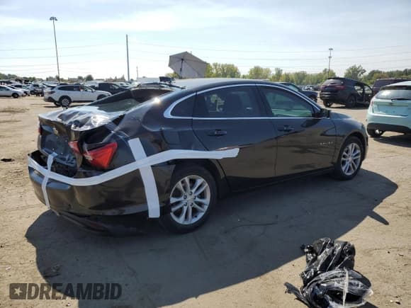 ✅ 2018 Chevrolet Malibu LT • VIN: 1G1ZD5ST4JF141449 • Lot: 80697135. Listed on Copart with 107,913 mi. Free auction sales archive from the USA and detailed vehicle history report at DreamBid. Image 3.