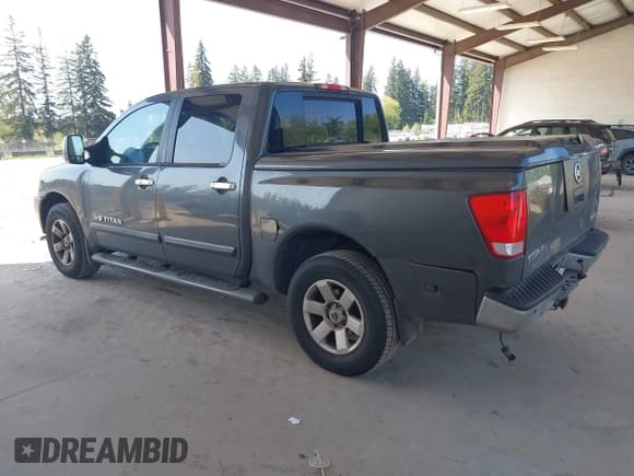 ✅ 2005 Nissan Titan LE • VIN: 1N6AA07B75N553857 • Lot: 42110183. Listed on IAAI with 166,064 mi. Free auction sales archive from the USA and detailed vehicle history report at DreamBid. Image 3.