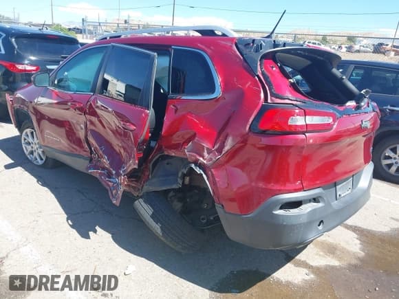 ✅ 2014 Jeep Cherokee Latitude • VIN: 1C4PJLCS8EW106307 • Lot: 43208676. Listed on IAAI with 101,389 mi. Free auction sales archive from the USA and detailed vehicle history report at DreamBid. Image 3.