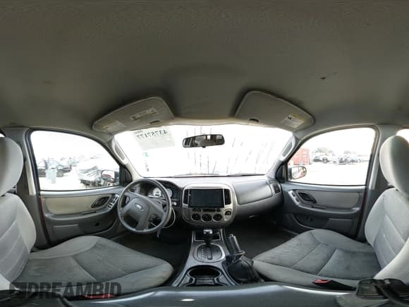 ✅ 2005 Ford Escape XLT • VIN: 1FMCU03105DA26924 • Lot: 43757177. Listed on IAAI with 198,875 mi. Free auction sales archive from the USA and detailed vehicle history report at DreamBid. Image 18.