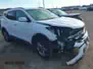 2018 Hyundai Santa Fe 2.4L z VIN 5NMZUDLB1JH097002, wystawiony jako IAAI lot #43473652 z przebiegiem 182 069 mil mil oraz . Historia ofert i sprzedaży dostępna na DreamBid. Obrazek 1.