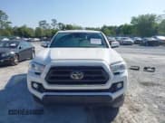 ✅ 2022 Toyota Tacoma SR • VIN: 3TYRX5GN2NT051624 • Lot: 42051441. Listed on IAAI with 84,532 mi. Free auction sales archive from the USA and detailed vehicle history report at DreamBid. Image 12.