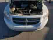 2011 Dodge Caliber Uptown z VIN 1B3CB9HA8BD269272, wystawiony jako Copart lot #42624035 z przebiegiem 143 054 mil mil oraz Szkoda całkowita • Salvage title. Historia ofert i sprzedaży dostępna na DreamBid. Obrazek 11.