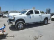 ✅ 2023 Ram 2500 Tradesman • VIN: 3C6UR5CL3PG636676 • Lot: 56949335. Listed on Copart with 61,984 mi. Free auction sales archive from the USA and detailed vehicle history report at DreamBid. Image 1.