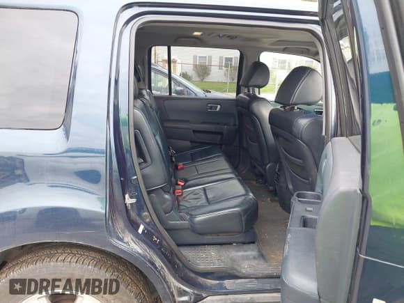 ✅ 2009 Honda Pilot EX-L • VIN: 5FNYF486X9B024077 • Lot: 43494857. Listed on IAAI with 237,580 mi. Free auction sales archive from the USA and detailed vehicle history report at DreamBid. Image 8.