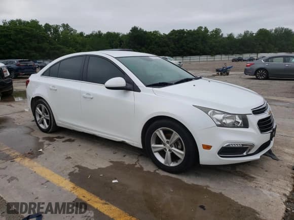 ✅ 2015 Chevrolet Cruze LT • VIN: 1G1PE5SB4F7186548 • Lot: 52078663. Listed on Copart with 133,058 mi. Free auction sales archive from the USA and detailed vehicle history report at DreamBid. Image 4.