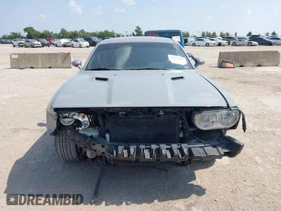 2012 Dodge Challenger SXT Plus z VIN 2C3CDYAG8CH176729, wystawiony jako IAAI lot #43219864 z przebiegiem 165 076 mil mil oraz . Historia ofert i sprzedaży dostępna na DreamBid. Obrazek 13.