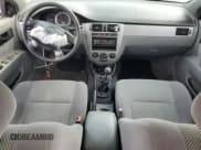 ✅ 2006 Suzuki Forenza • VIN: KL5JD56Z96K362651 • Лот: 78306894. Опубликован ранее на Copart с пробегом 167 916 миль. Бесплатный доступ к архиву аукционных продаж из США и подробный отчёт об истории автомобиля на DreamBid. Изображение 8.